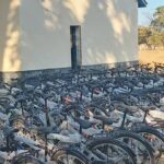 Hon Chamu Chiwanza handouts 168 bicycles and rice to women in Mhondoro Mubaira Central